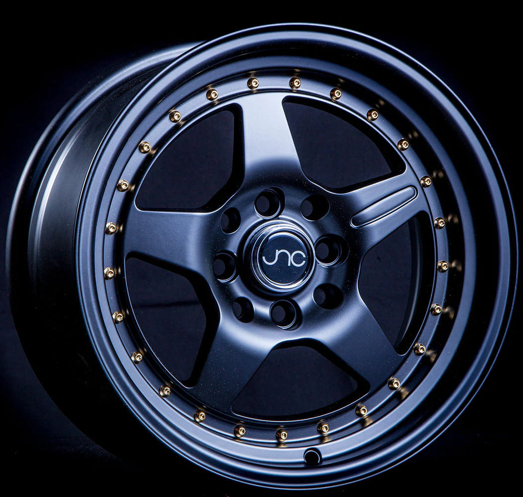 JNC JNC009 Matte Black Wheel With Gold Rivets - 15x8 / 4x100/4x114.3 / +25